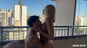 brazilian blonde vivian lola teases in camisole on new apartment balcony