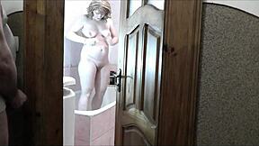 sexy blonde strips naked in bathroom roommate spies jerks off and shoots load on her wet natural tits