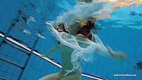 kristy hot babe with HUGE boobs swims underwater... damn!