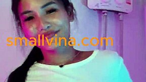 This cute nude thai teen gropes her petite ass on cam