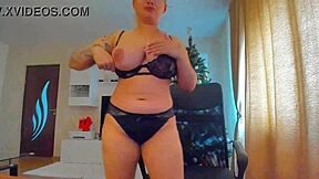 busty black lingerie girl teases her big tits on cam