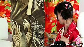 cute asian babe gives slippery nuru handjob massage