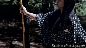 cute asian babe gives slippery nuru handjob massage