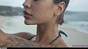 Skinny asian babe fingers pussy on crowded public beach