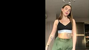 Stripping slowly while teasing and touching myself for you