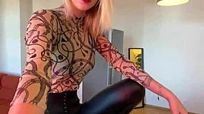 sophie van loo heats kitchen counter in gray leggings high heels