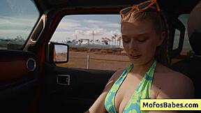 sexy blonde teen sways natural juicy boobs teasing friend in car ride