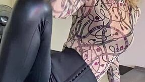 sophie van loo heats kitchen counter in gray leggings high heels