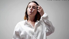 Who's peeking at this cheeky brunette's bra tease?