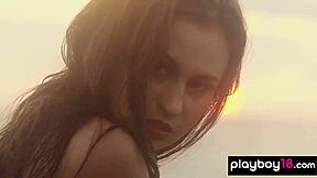 Watch adorable skinny Ukrainian muse Demi Fray strip naked on rocks?