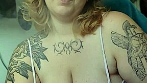 Chubby milf smokes while smothering you with huge tits!