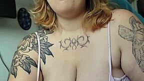 Chubby milf smokes while smothering you with huge tits!