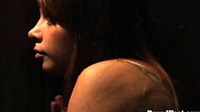 blonde slave bound in garage chains gets whipped hard by mistress