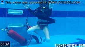 Check out horny Ashlee Rose in her slutty dress scuba diving underwater.