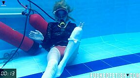 Check out horny Ashlee Rose in her slutty dress scuba diving underwater.