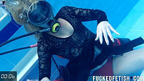 Check out horny Ashlee Rose in her slutty dress scuba diving underwater.