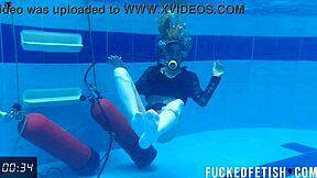 Check out horny Ashlee Rose in her slutty dress scuba diving underwater.