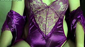 she slips her curves into a white satin dress before masturbating wildly alone