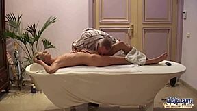 Naughty grandpa pounds teen tits on massage table cumshot