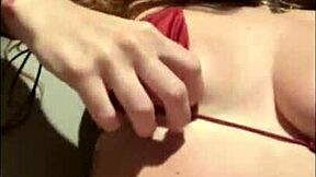 that nympho redhead beach babe fingers her sandy wet pussy non-stop