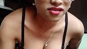 office asian ladyboy strokes her hard cock solo