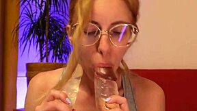 Curvy Blonde Teen Licks Two Huge Dildos With Braces