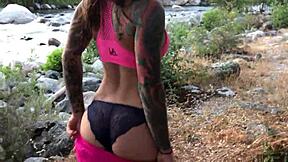 hiker babe felicity feline drops to knees outdoors sucking tattooed cock in sneakers