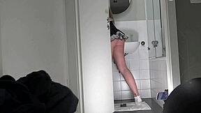 amazing college coed flashes her big ass in bathroom miniskirt