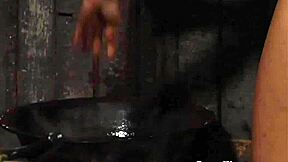 Young maid scrubs while busty blonde mistress lounges in bath