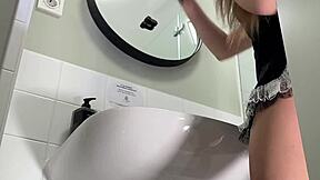 amazing college coed flashes her big ass in bathroom miniskirt