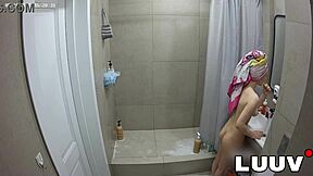 Grossy brunette flashes shaved pussy shower routine