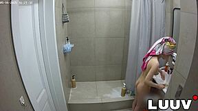Grossy brunette flashes shaved pussy shower routine