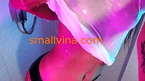 Petite Thai teen strips big ass in bathroom