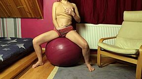 FITNESS MILF RIDES DILDO ON FITBALL AND SQUIRTS HARD!