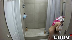 Grossy brunette flashes shaved pussy shower routine