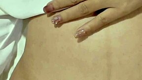 A BEAUTIFUL VIETNAMESE LADY IN TRADITIONAL ATTIRE OUTDOOR HANDJOB ORGASM