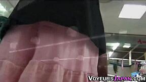 who's spying this unsuspecting asian teen upskirt outdoors?