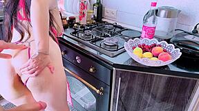 mature cachonda fucks in kitchen while hubby watches tv