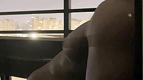 Damn, sexy brunette's balcony deepthroat blowjob has me drooling—watch her swallow!