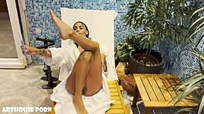 petite latina's oiled feet stroke cock in sauna