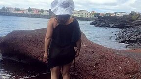 curvy brunette flashes big tits pussy beach photoshoot tease