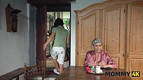 horny milf bounces on young boyfriend atop kitchen counter