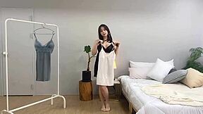 Korean babe spends sexy day swapping clothes in her room