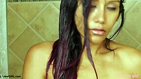 elegant brunette steps into steamy shower, soaping her curves slowly