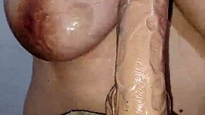 i'm a horny cuarentona milf rubbin my huge tits n suckin dildo hard