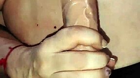 i'm a horny cuarentona milf rubbin my huge tits n suckin dildo hard