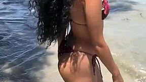 Cute ebony teen bares her pussy outdoors!