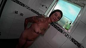 Two Brazilian Teens Play with Big Asses in Shower