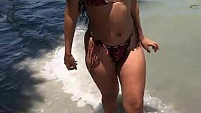 Cute ebony teen bares her pussy outdoors!