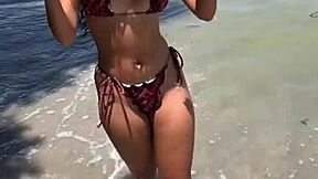 Cute ebony teen bares her pussy outdoors!